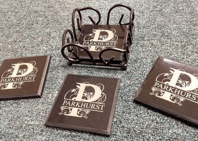 Laser-engraved coaster sets by Bolt Laserworks