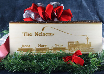 Live-edge Holiday Signs by Bolt Laserworks